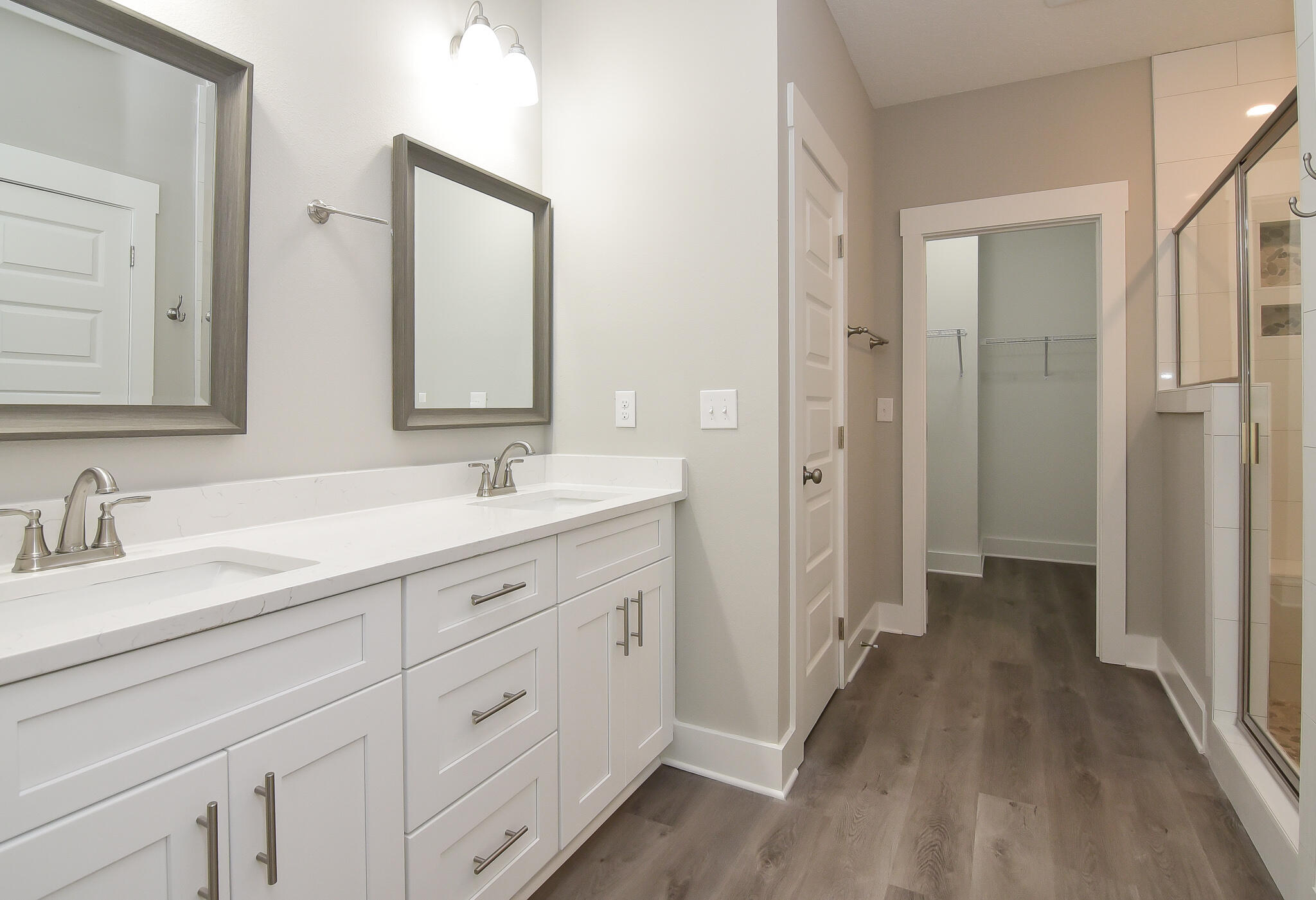 667 Red Fern Road Crestview, FL 32536 - Photo 16 of 32 a spacious bathroom with a double vanity sink double and mirror