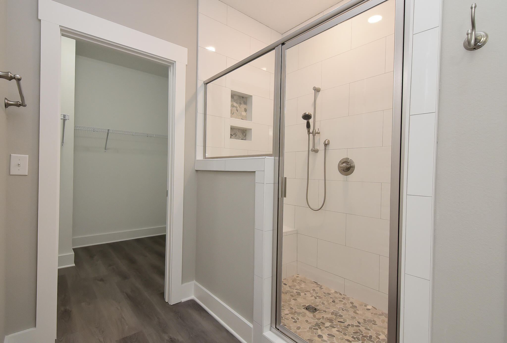 667 Red Fern Road Crestview, FL 32536 - Photo 17 of 32 a bathroom with a glass shower door