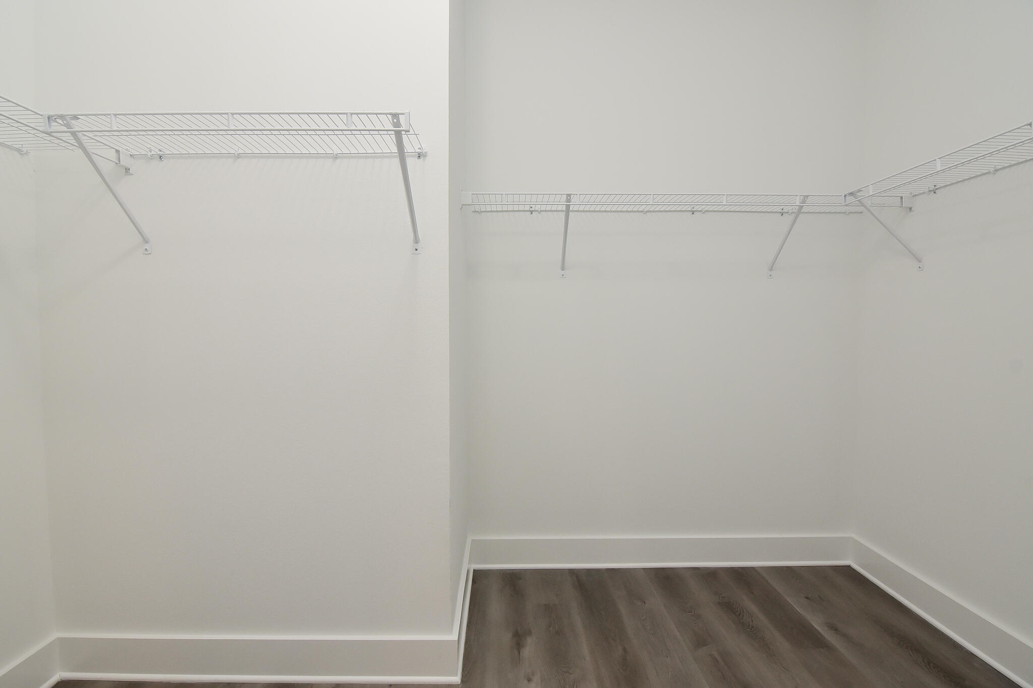 667 Red Fern Road Crestview, FL 32536 - Photo 18 of 32 a view of a room with racks on the wall