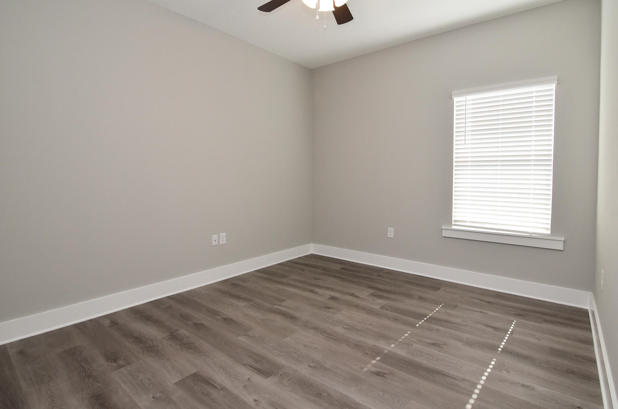 667 Red Fern Road Crestview, FL 32536 - Photo 2 of 32 an empty room with a window