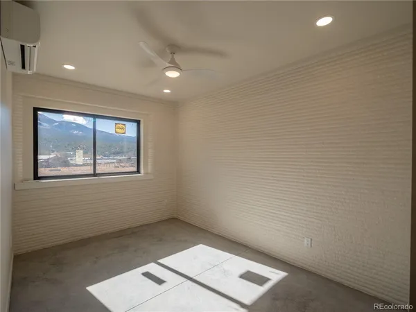 an empty room with windows