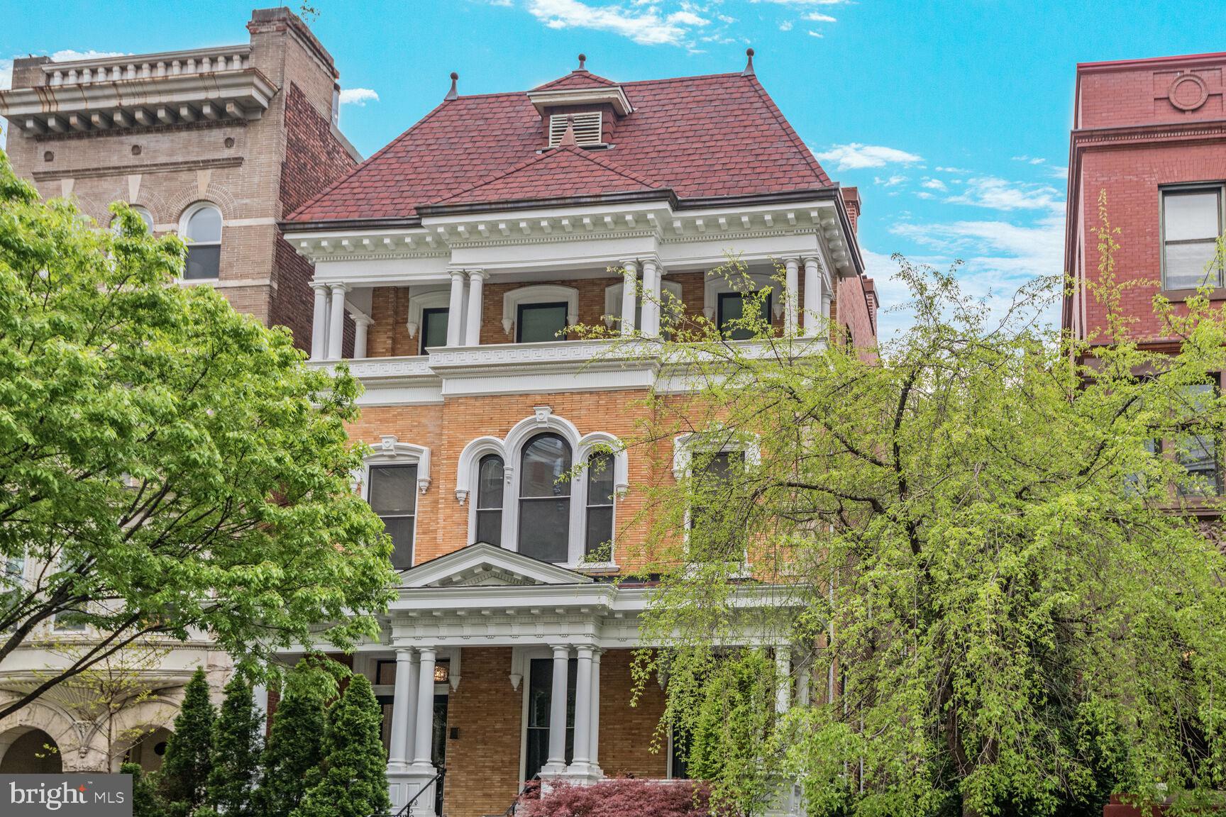 2009 Columbia Road Northwest, Unit 3 Washington, DC 20009 - Photo 1 of 16 a front view of a house with a yard