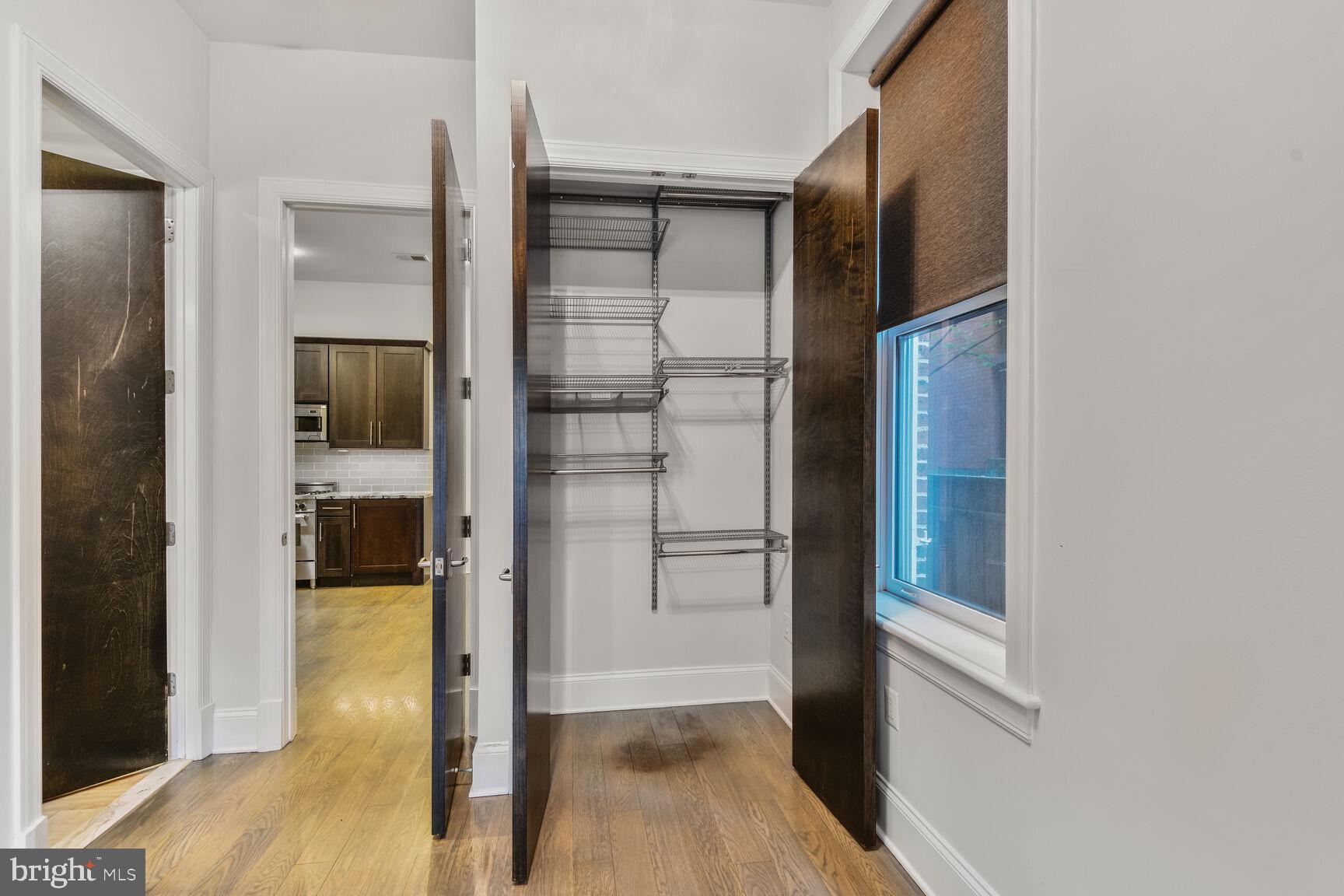 2009 Columbia Road Northwest, Unit 3 Washington, DC 20009 - Photo 11 of 16 a bathroom with a glass shower door