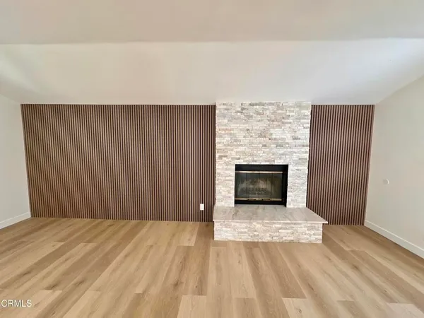 a view of a livingroom with a fireplace