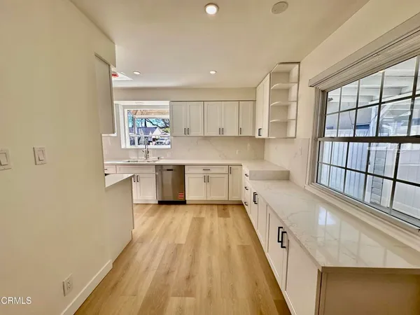 a large kitchen with a lot of counter space