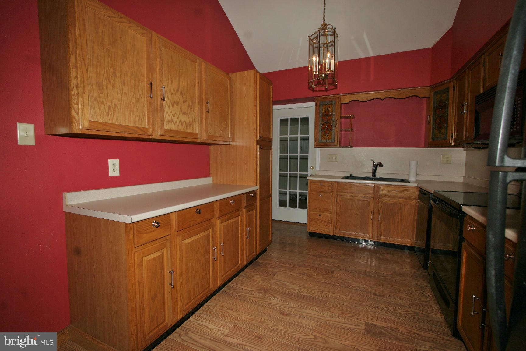 13102 Draper Road Clear Spring, MD 21722 - Photo 8 of 26 a kitchen with stainless steel appliances granite countertop a sink and cabinets