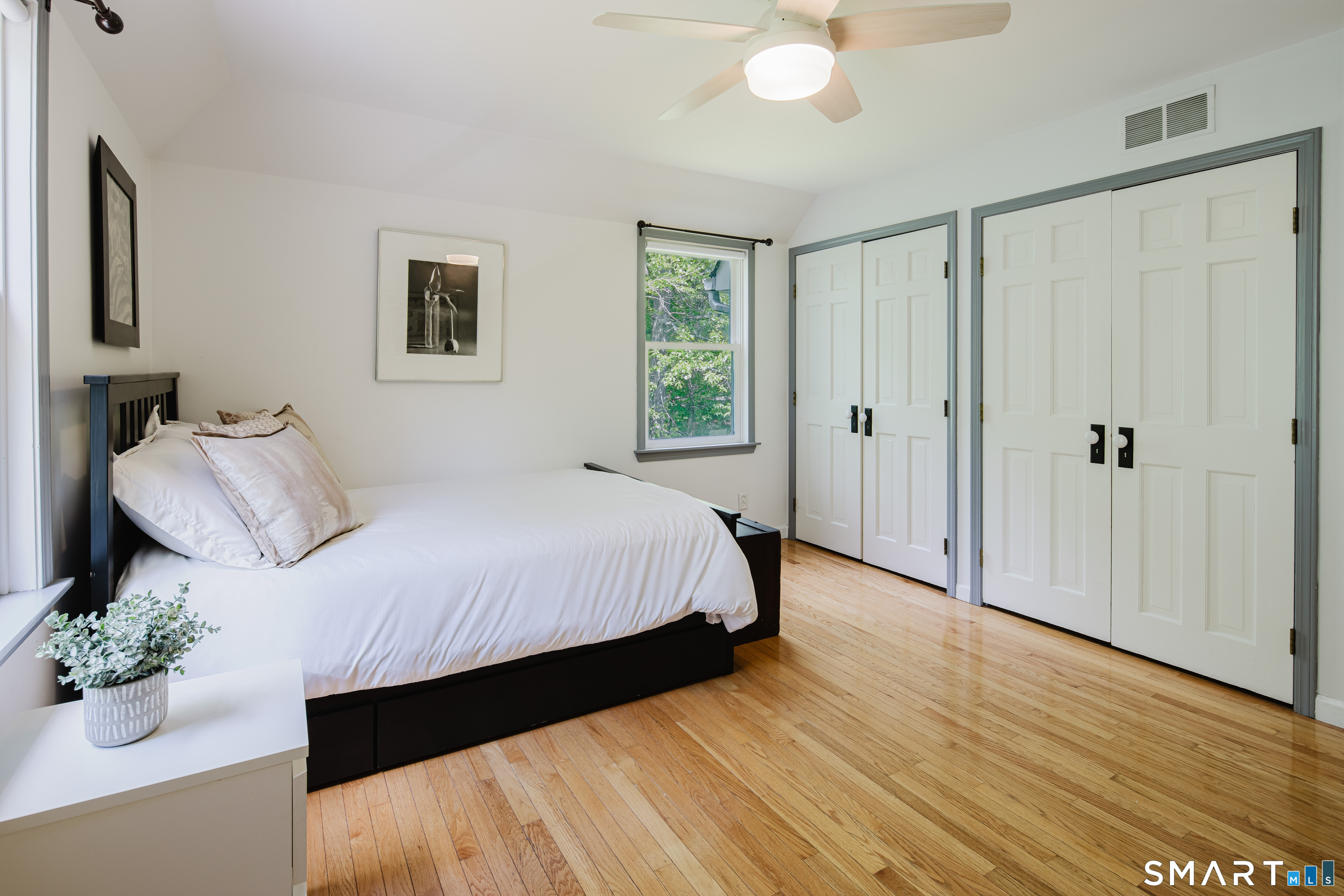 3 Partridge Trail Sherman, CT 06784 - Photo 34 of 37 a spacious bedroom with a bed and a table