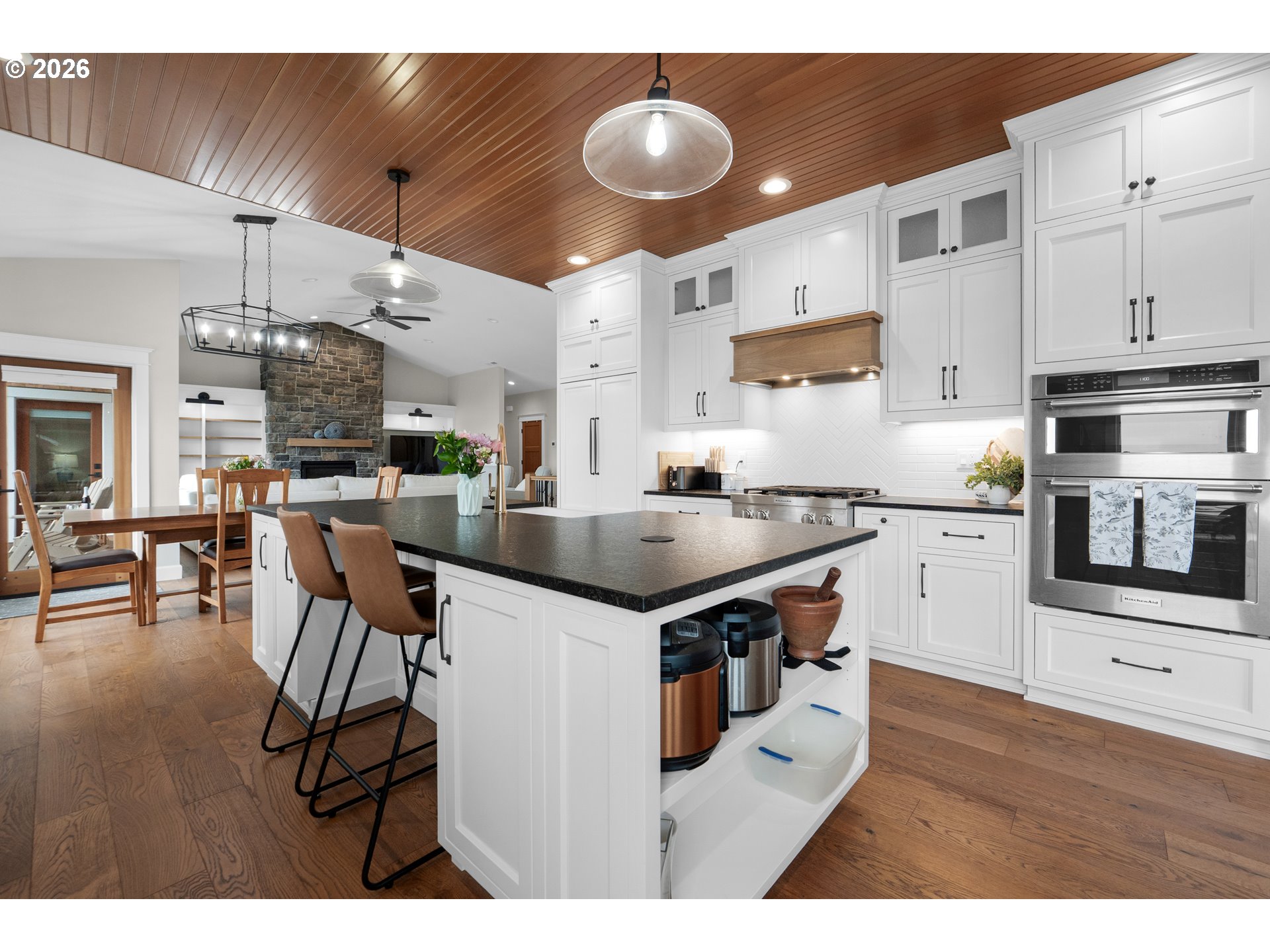 38590 Meadow Loop Nehalem, OR 97131 - Photo 14 of 48 a kitchen with stainless steel appliances granite countertop a stove and a refrigerator