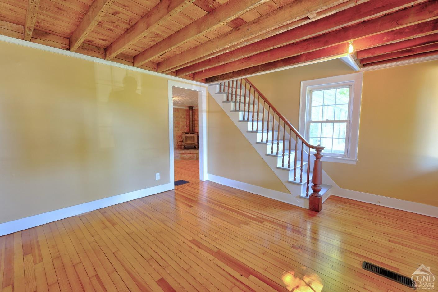 21 Irondale Road Millerton, NY 12546 - Photo 13 of 73 a view of an empty room with wooden floor