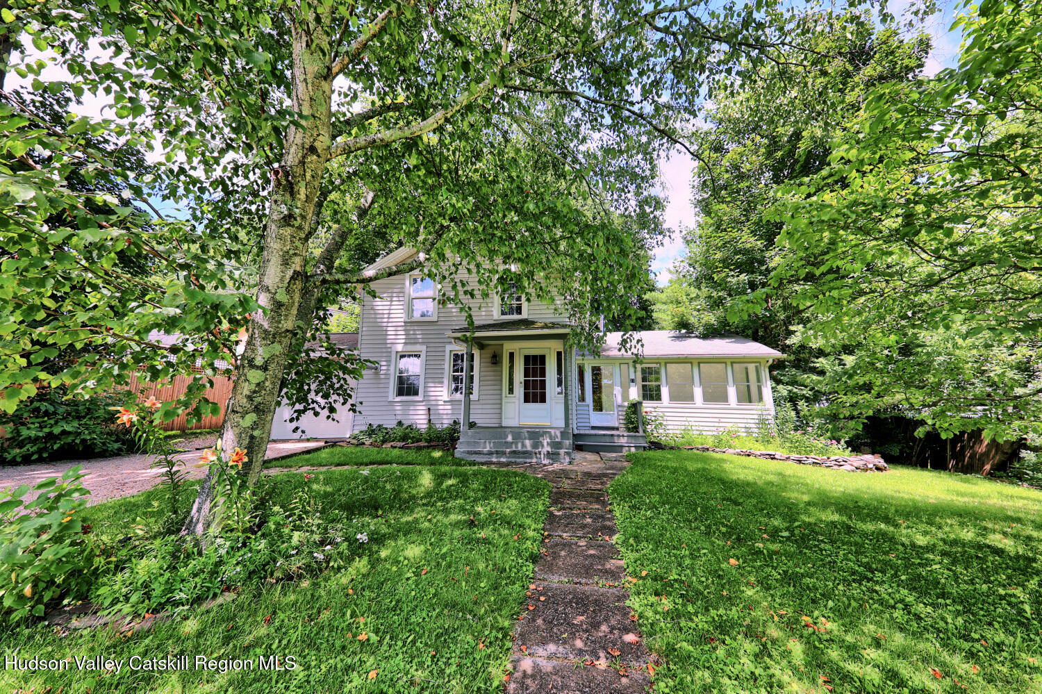 21 Irondale Road Millerton, NY 12546 - Photo 3 of 73 a front view of a house with a yard