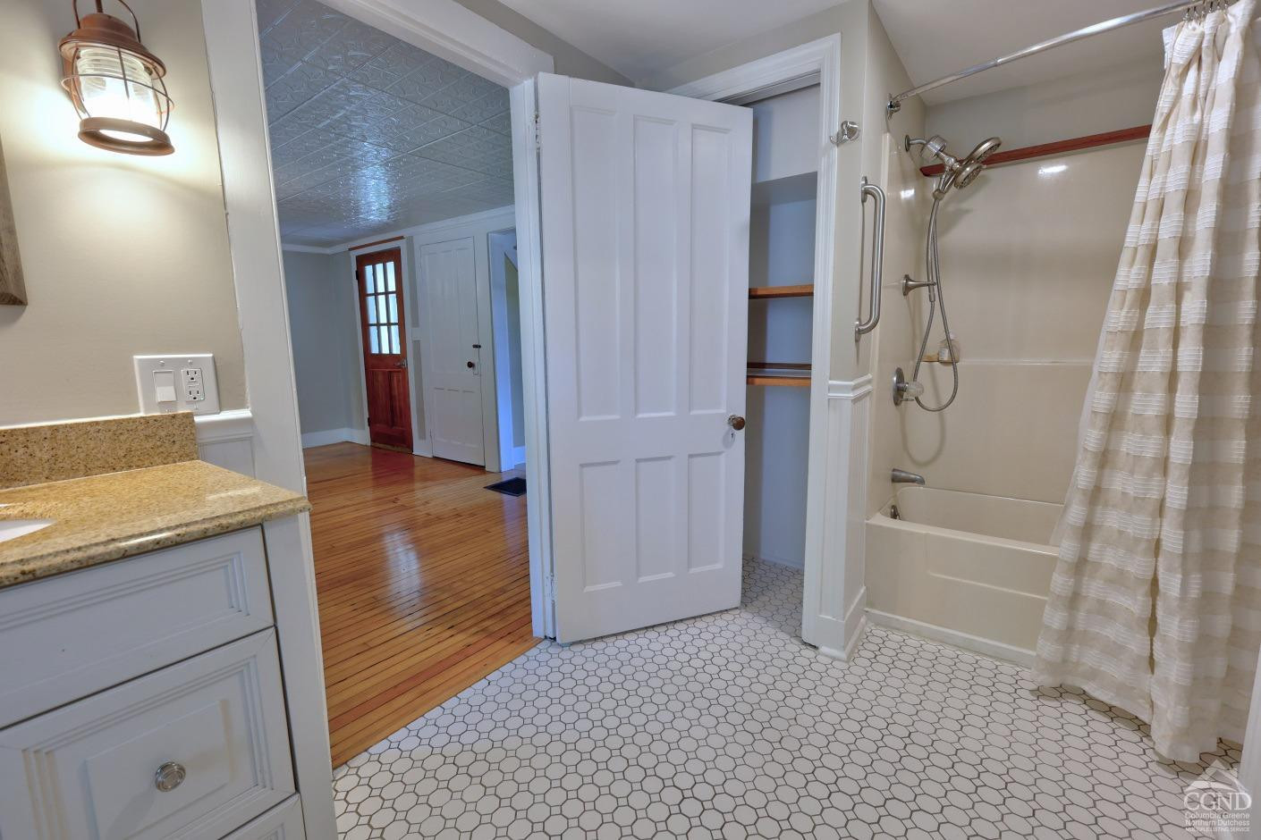 21 Irondale Road Millerton, NY 12546 - Photo 35 of 73 a bathroom with a granite countertop sink a toilet and shower