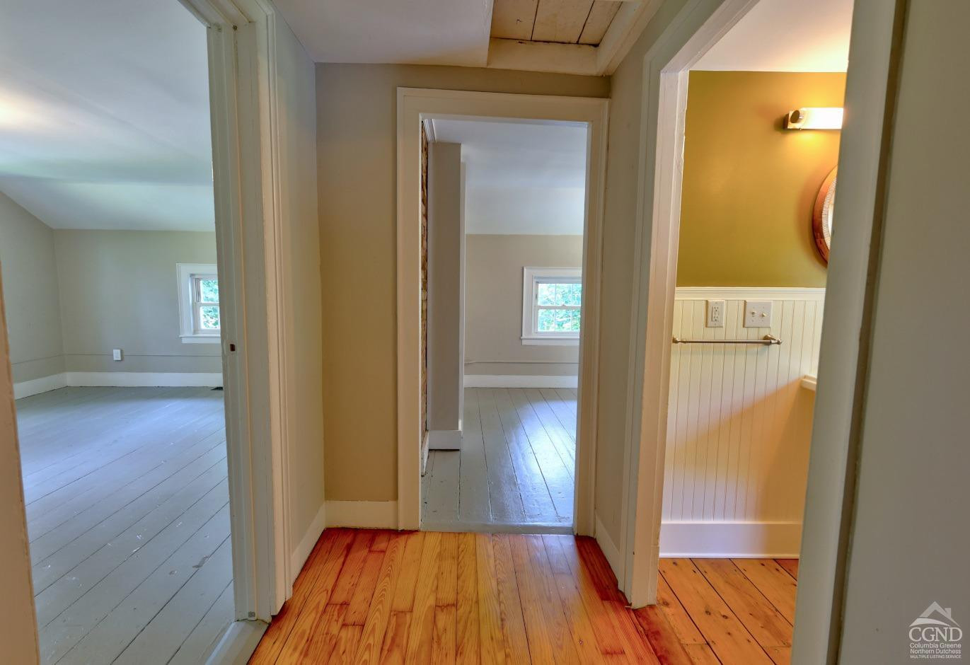 21 Irondale Road Millerton, NY 12546 - Photo 43 of 73 a view of a hallway with wooden floor