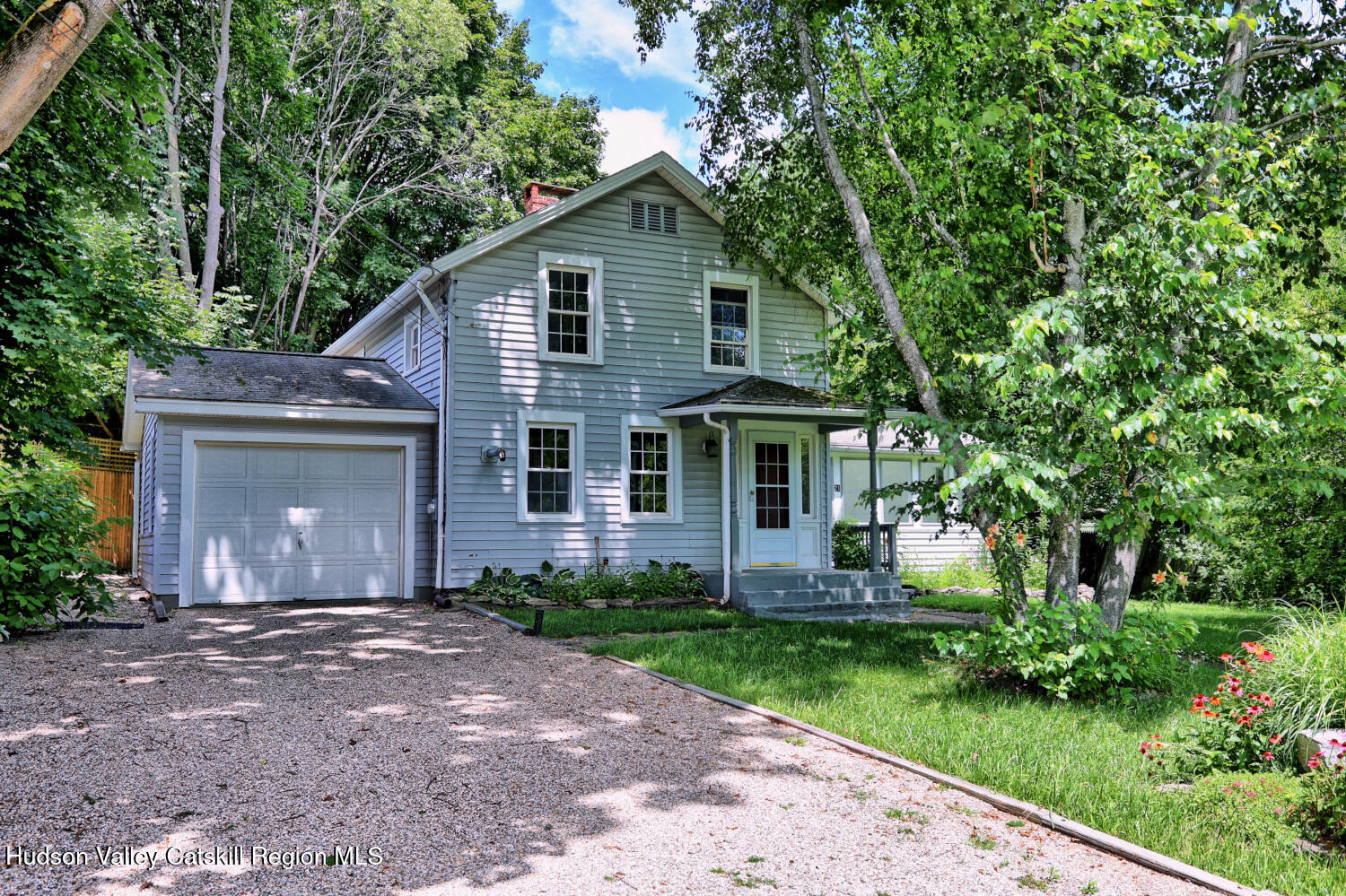 21 Irondale Road Millerton, NY 12546 - Photo 5 of 73 a front view of a house with garden