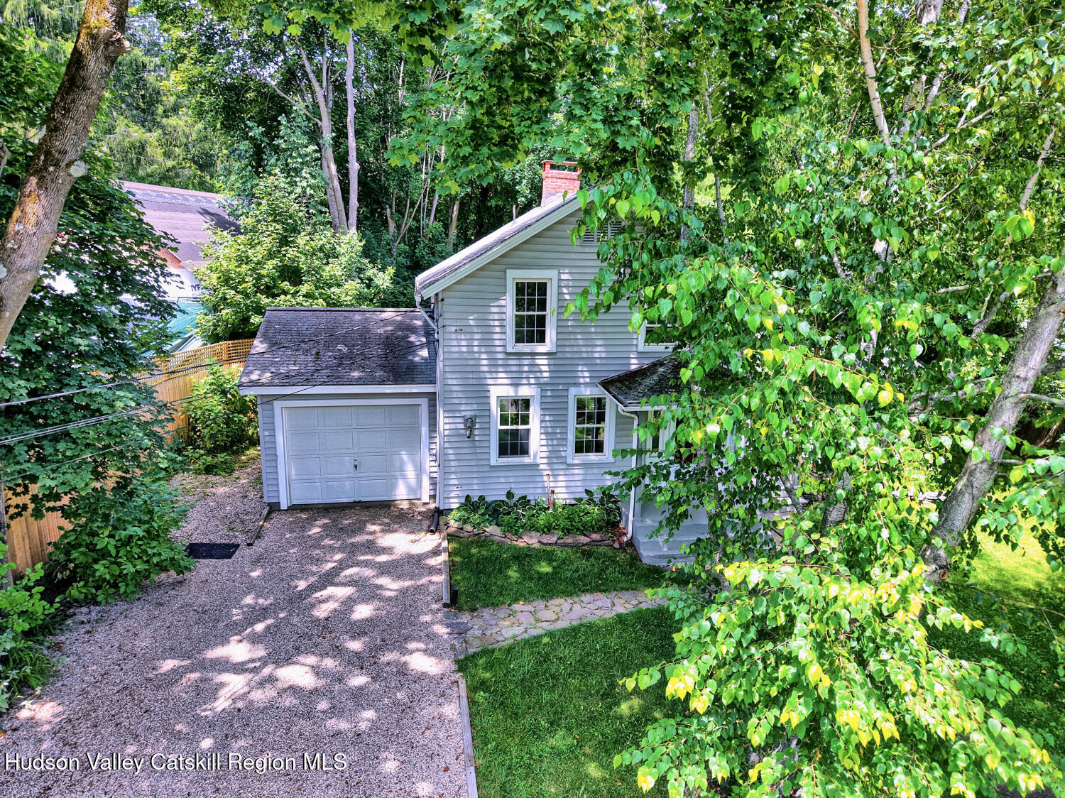 21 Irondale Road Millerton, NY 12546 - Photo 66 of 73 a front view of a house with a garden