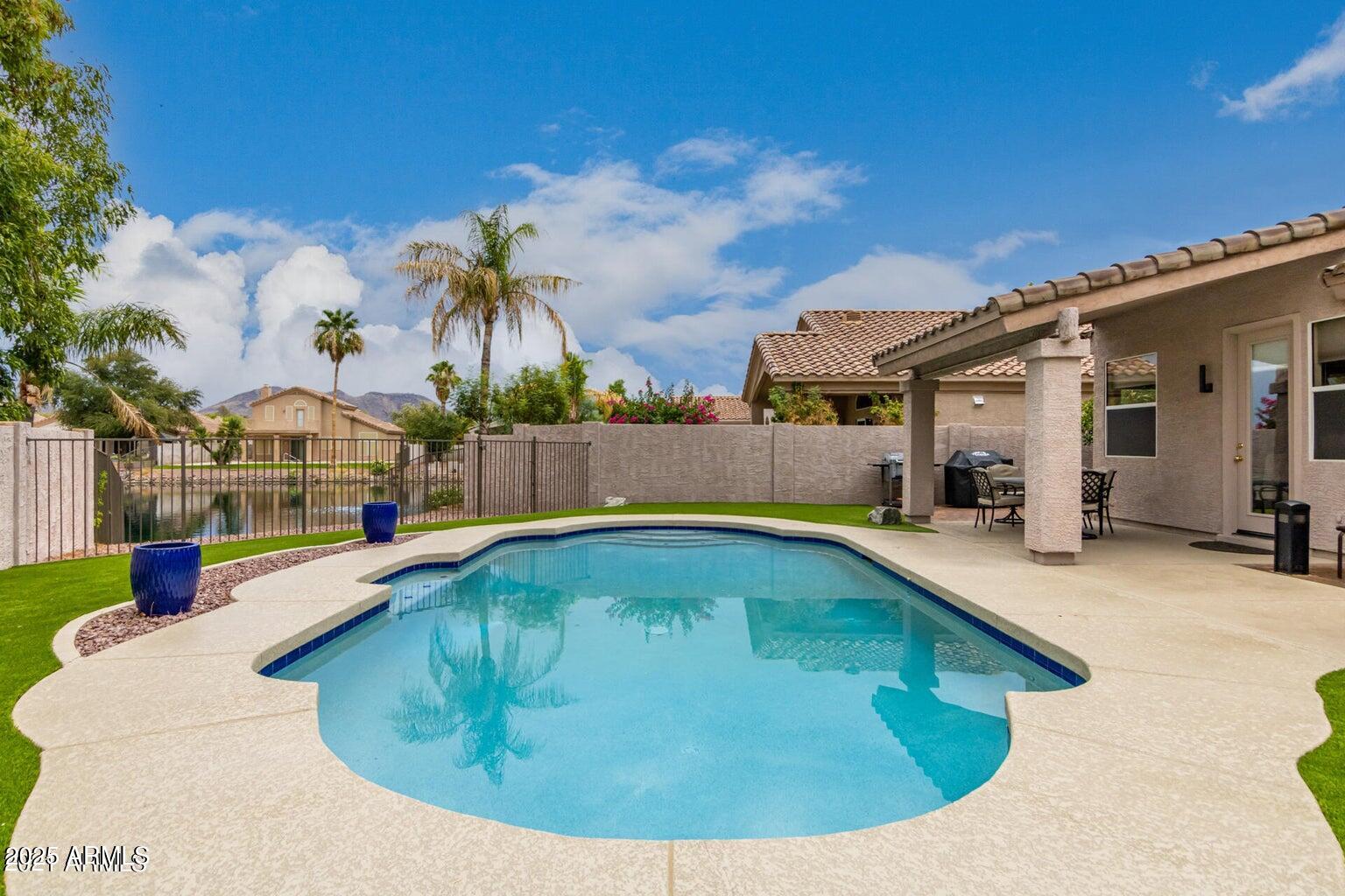 6230 West Irma Lane Glendale, AZ 85308 - Photo 6 of 21 a view of a house with swimming pool