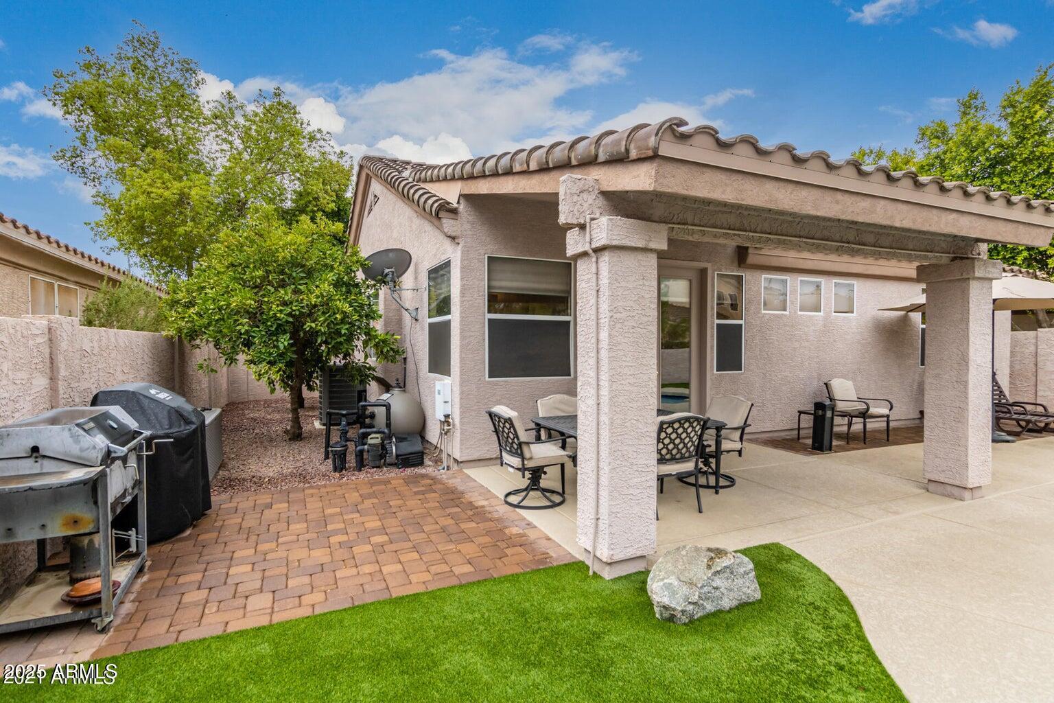 6230 West Irma Lane Glendale, AZ 85308 - Photo 8 of 21 a view of a patio with chair and tables