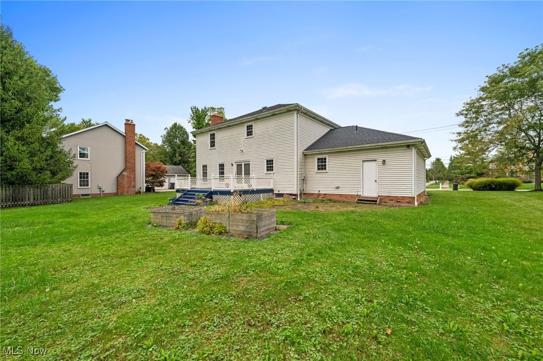 31655 Arthur Road Solon, OH 44139 - Photo 26 of 27 Rear view of property with a yard