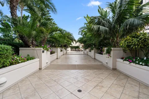 a view of tall building with view of outdoor space and swimming pool