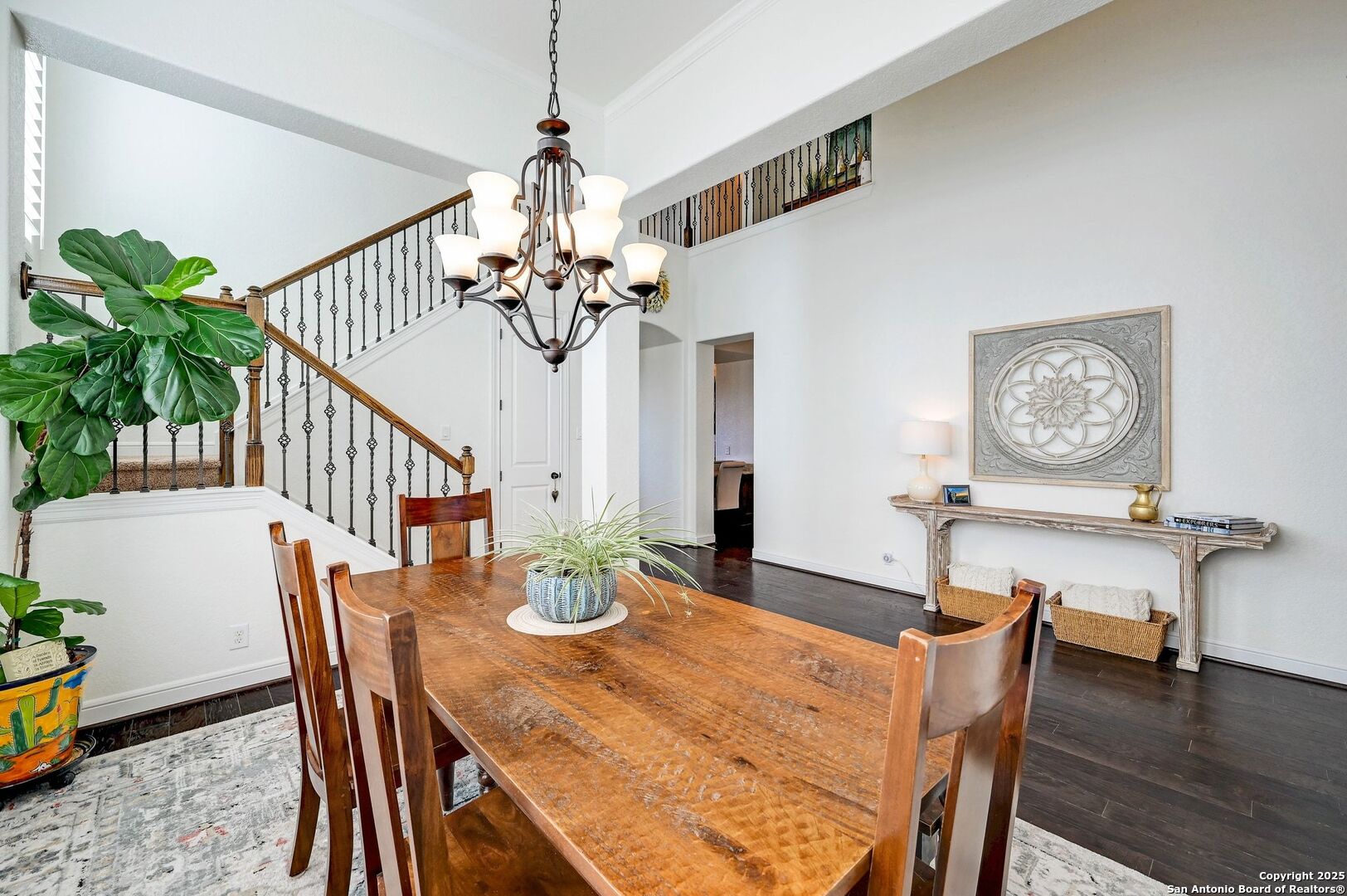 17023 Turin Ridge San Antonio, TX 78255 - Photo 18 of 48 a view of a dining room with furniture and wooden floor