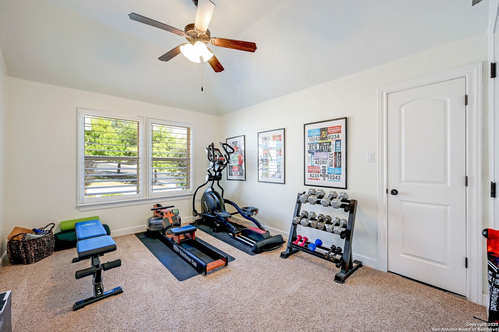17023 Turin Ridge San Antonio, TX 78255 - Photo 36 of 48 a room with gym equipment and a window