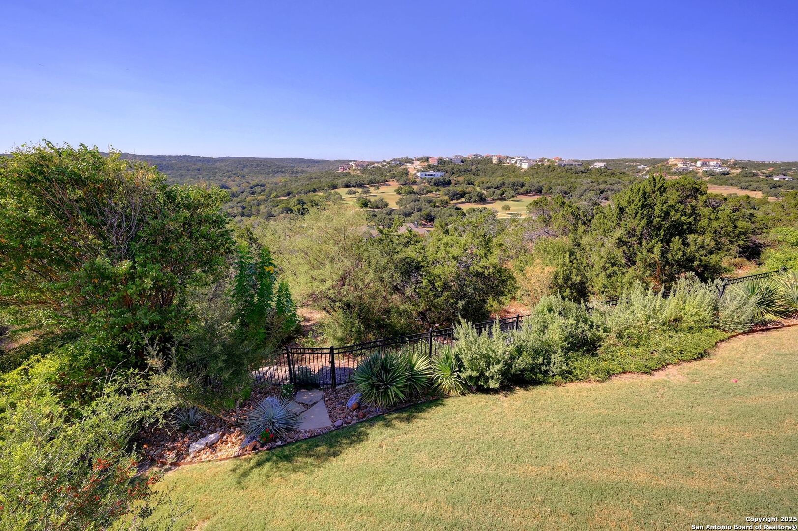 17023 Turin Ridge San Antonio, TX 78255 - Photo 5 of 48 an aerial view of a house with a yard