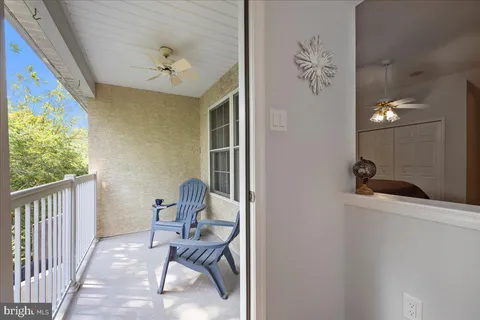 a view of a hallway with workspace