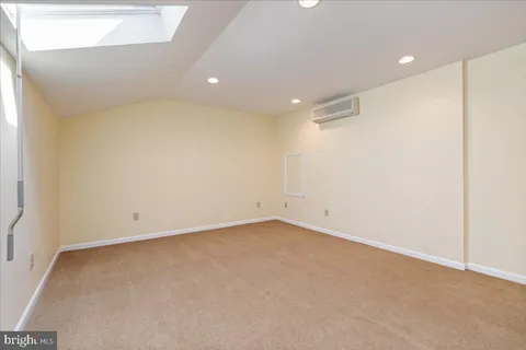 an empty room with a workbench