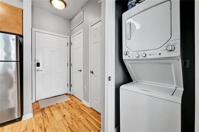 a view of bathroom with washer and dryer