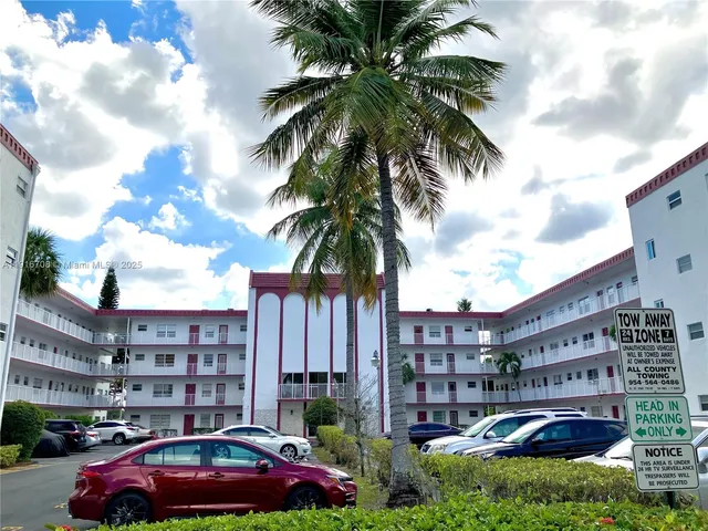 a cars parked in front of a building
