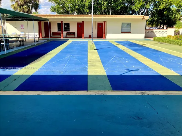 a kitchen with a stove and a microwave