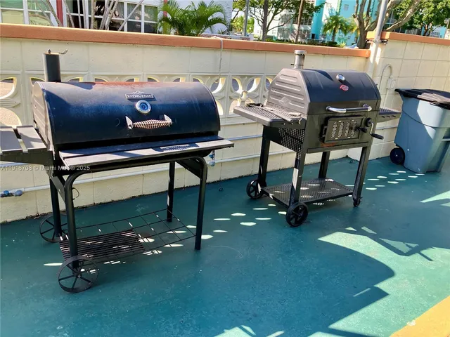 a kitchen with stainless steel appliances a refrigerator and a sink