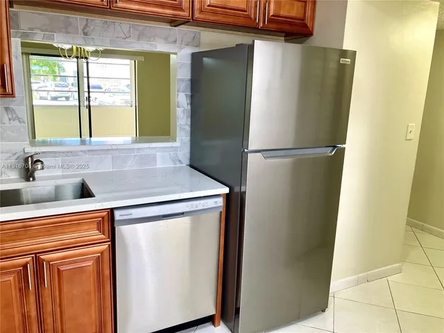 a bathroom with a toilet and bathtub