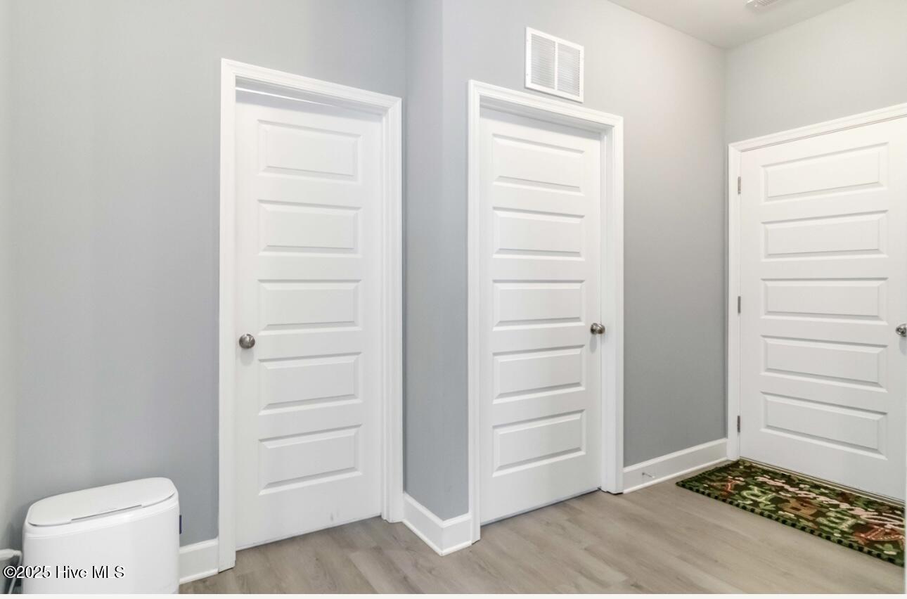 9735 Chapman Road Bailey, NC 27807 - Photo 18 of 31 Hallway between laundry & Garage