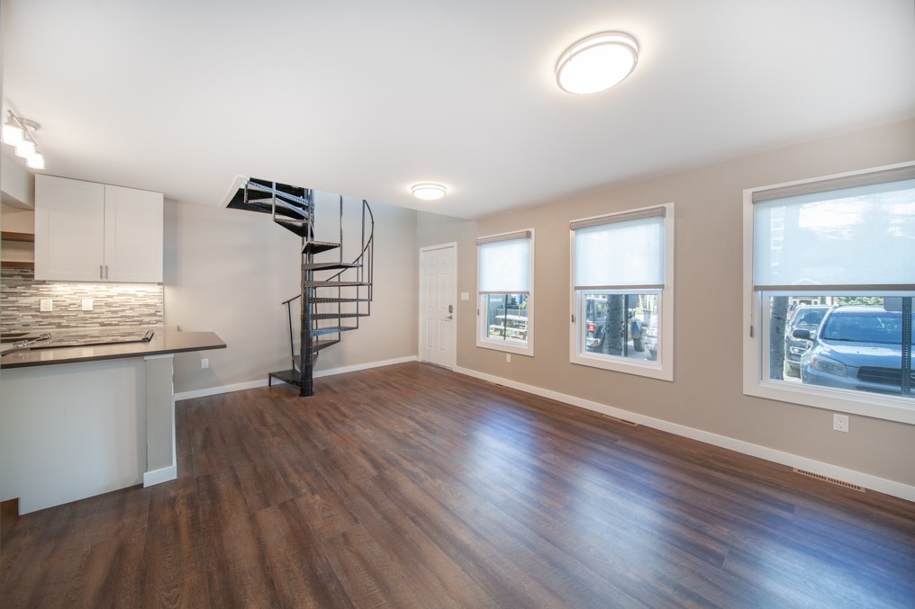 214 South Ridge Street, Unit 5 Breckenridge, CO 80424 - Photo 15 of 16 New flooring, trim, windows, blinds, drywall, light fixtures. The space above the door and next to the spiral staircase could be modified to have a storage closet.