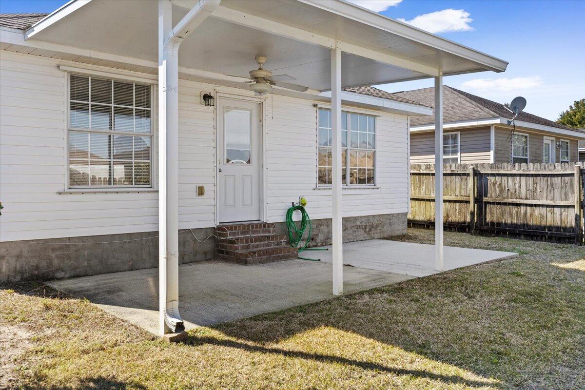 5414 Fawn Ridge Drive Gulf Breeze, FL 32563 - Photo 21 of 31 a view of a house with a backyard