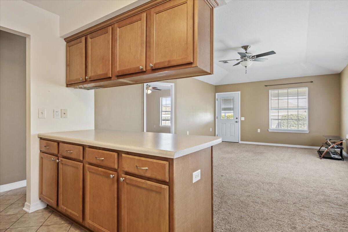 5414 Fawn Ridge Drive Gulf Breeze, FL 32563 - Photo 9 of 31 a view of a kitchen with electric appliances