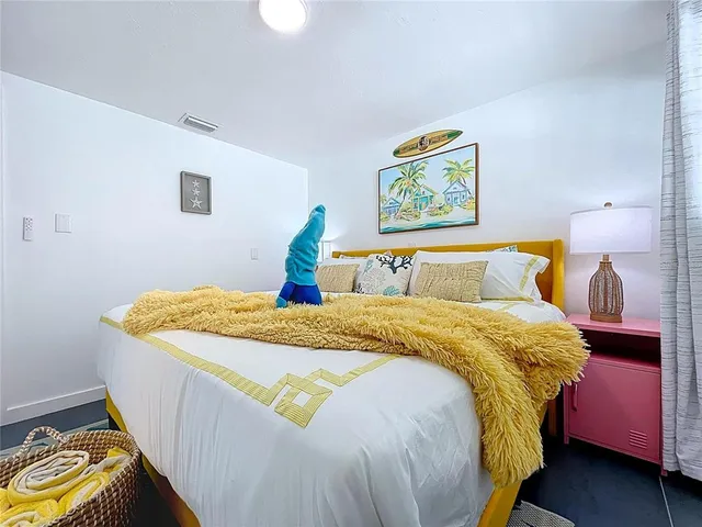 a room with a sink and a mirror