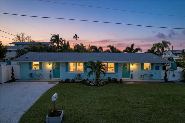 a house view with a garden space