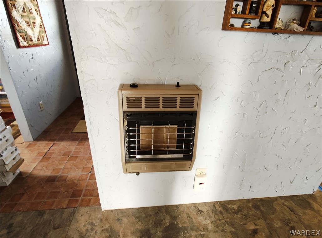 15 County Road Concho, AZ 85924 - Photo 69 of 93 Wall-mounted heater with white textured wall finish