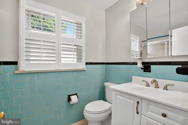 a bathroom with a shower and a shower