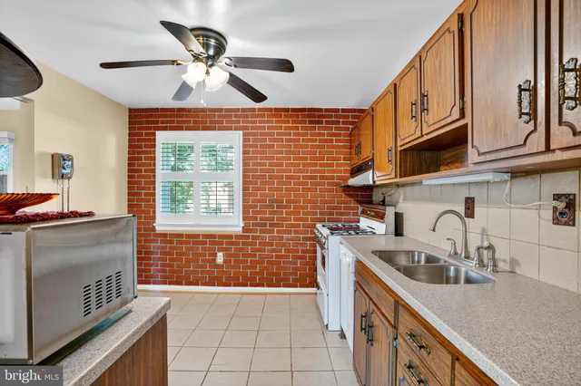 a bedroom with a large bed and a flat screen tv