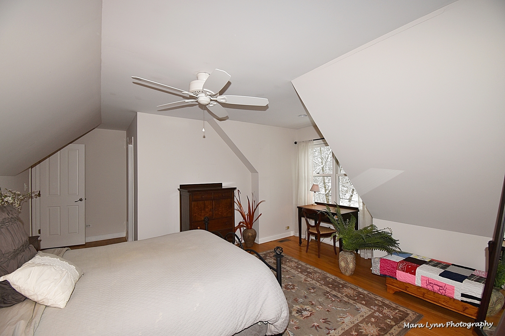 6N353 State Rte 31 St. Charles, IL 60175 - Photo 40 of 124 a bedroom with a bed and a chandelier