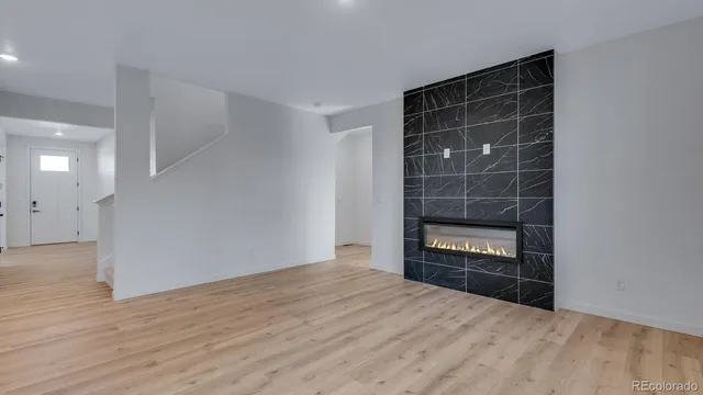 a empty room with a empty space and a window