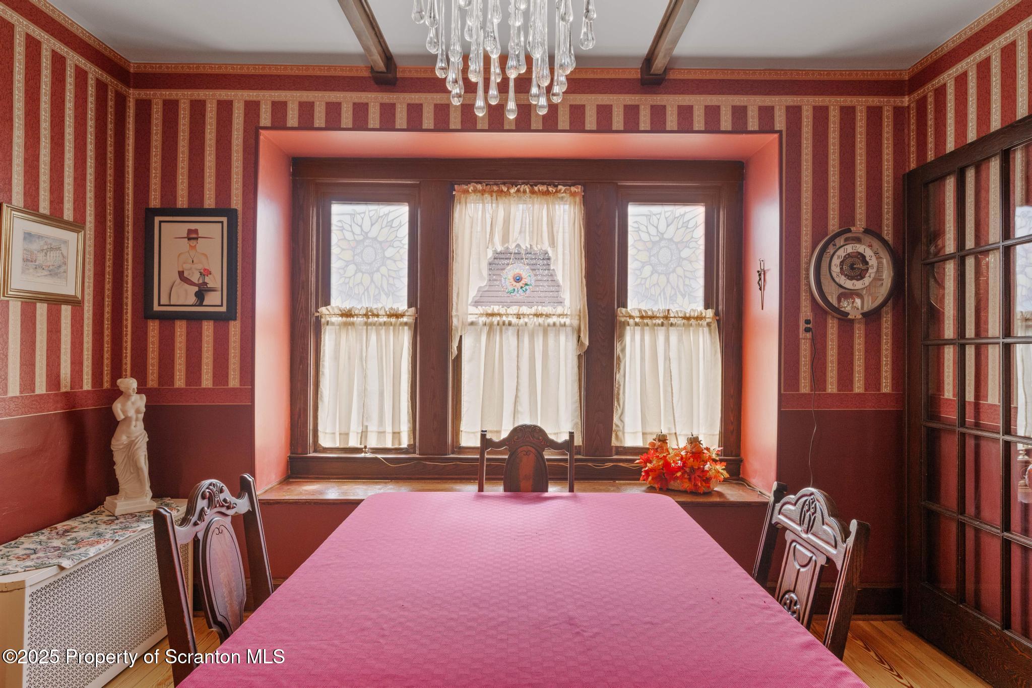 216 Maple Avenue Clarks Summit, PA 18411 - Photo 14 of 51 a room with gym equipment and a large window