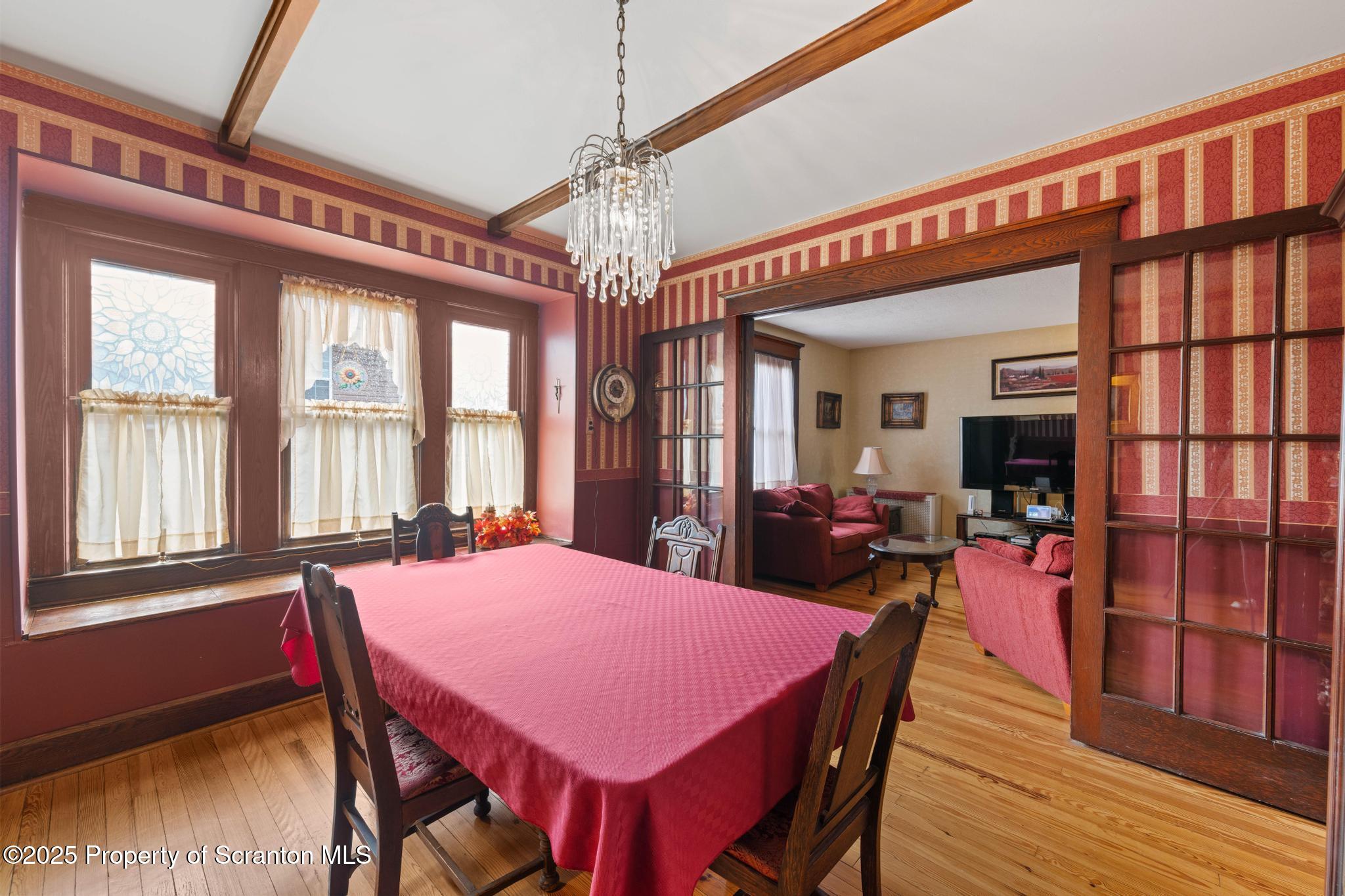 216 Maple Avenue Clarks Summit, PA 18411 - Photo 15 of 51 a view of a dining room with furniture window and wooden floor
