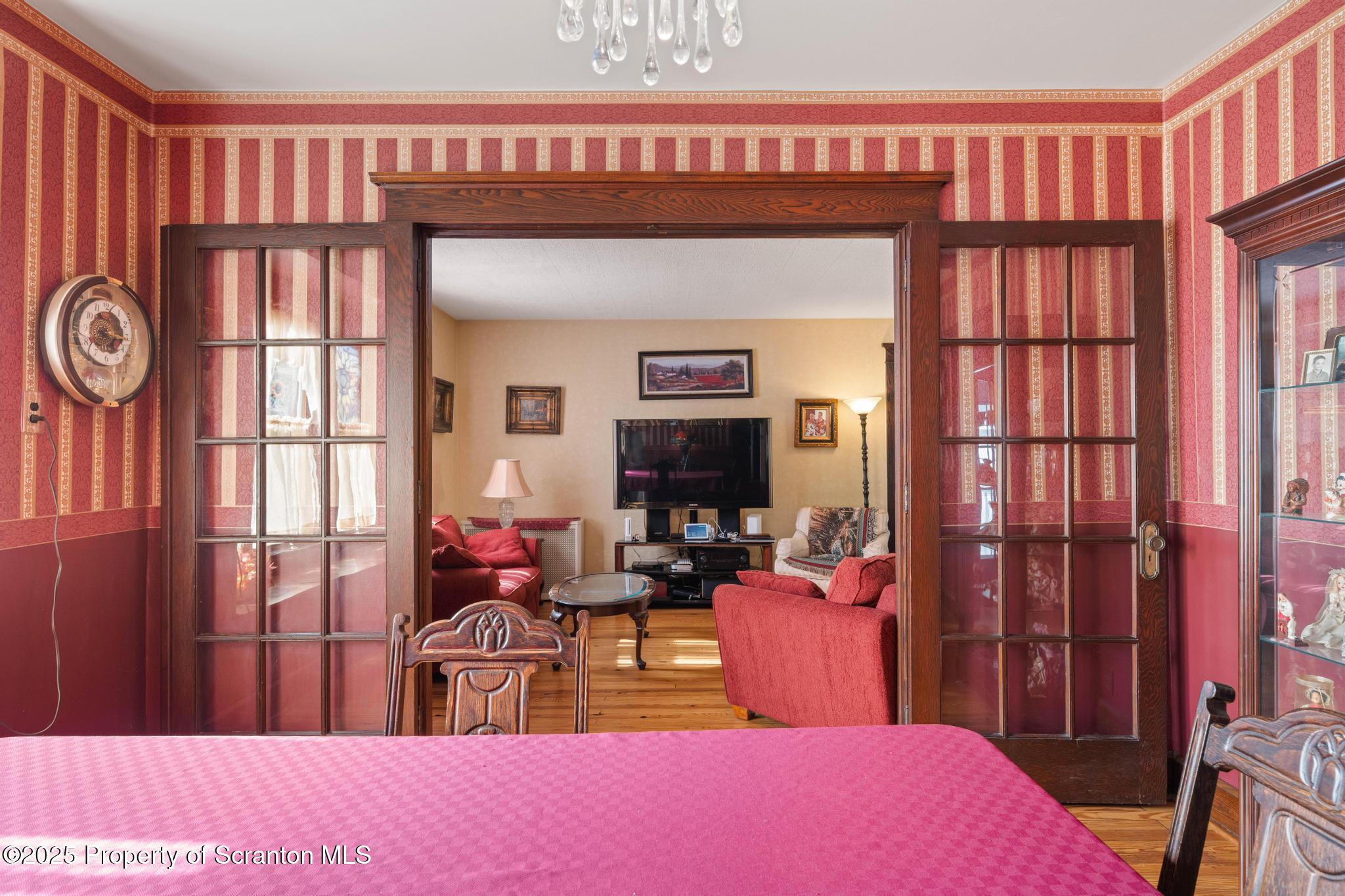 216 Maple Avenue Clarks Summit, PA 18411 - Photo 16 of 51 a bedroom with a bed and wooden floor