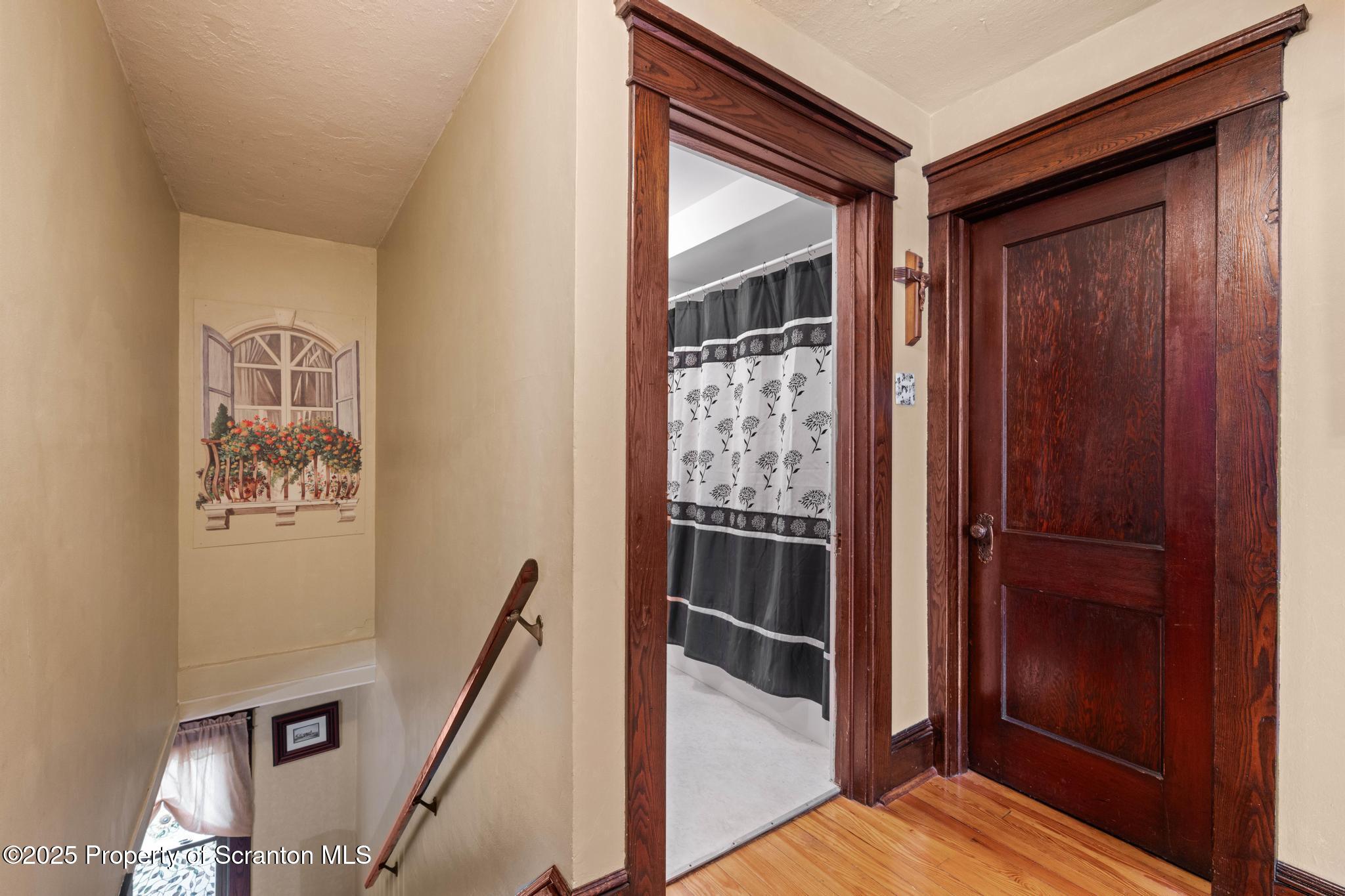 216 Maple Avenue Clarks Summit, PA 18411 - Photo 22 of 51 a view of a hallway and wooden floor and entryway