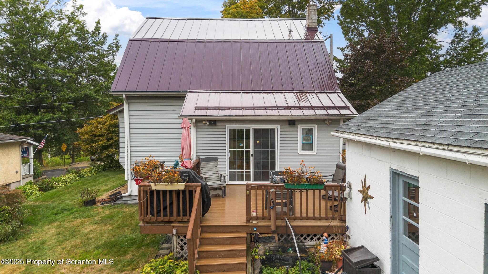 216 Maple Avenue Clarks Summit, PA 18411 - Photo 44 of 51 a front view of a house with garden