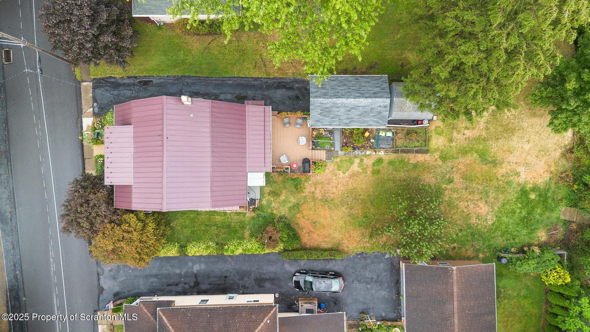 216 Maple Avenue Clarks Summit, PA 18411 - Photo 47 of 51 an aerial view of a house with a yard