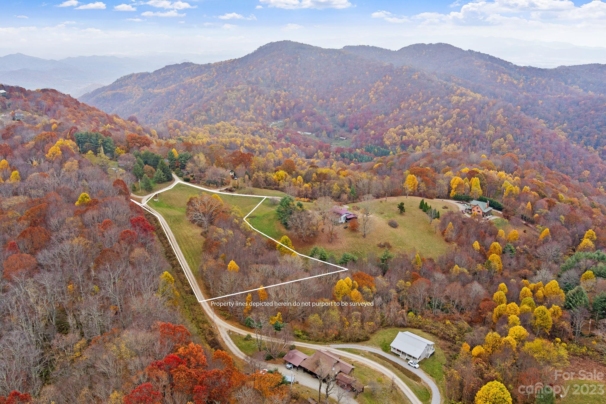 99999 Pioneer Ridge Road, Unit 56 Canton, NC 28716 - Photo 1 of 25 a view of a city with a mountain